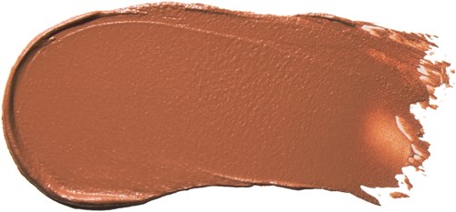Ein brauner Make-up- oder Foundation-Strich auf schwarzem Hintergrund.