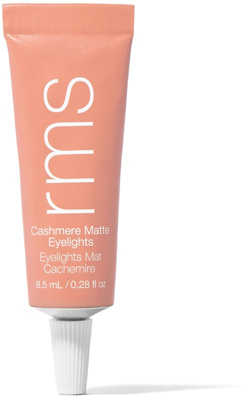 Ein peachfarbiger Tube von SMY Cashmere Matte Eyelights mit weißer Kappe, 8,5 ml.