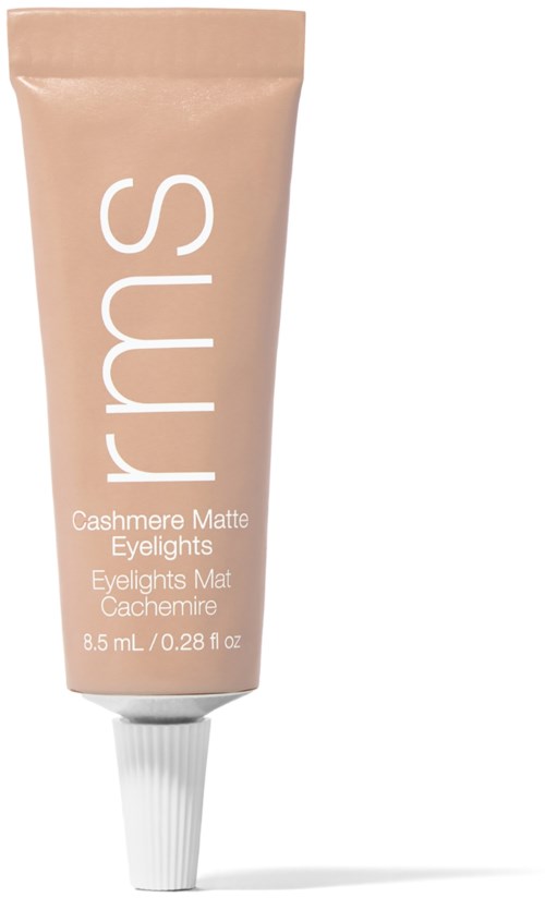 Tube eines RMS Cashmere Matte Eyelights Kosmetikprodukts mit beiger Verpackung und weißem Text.