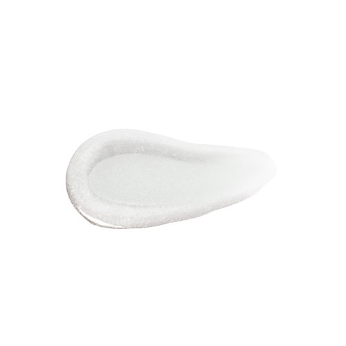 Ein Klecks weiße Creme oder Salbe in Tränenform.