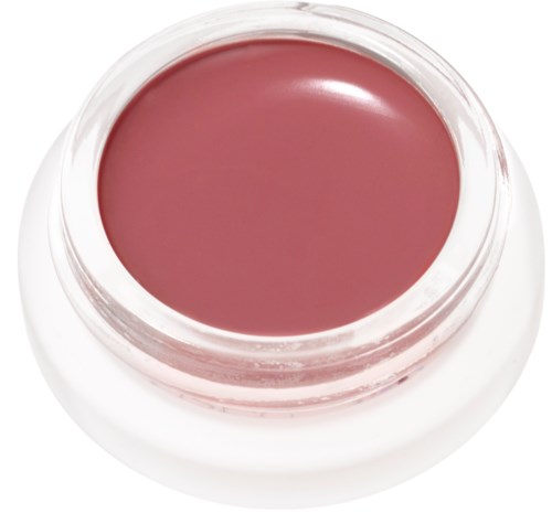 Ein kleiner Behälter mit rosa Lippenbalsam oder Kosmetikprodukt in einer klaren Verpackung.