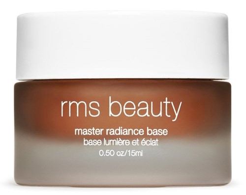 A brown jar with a white lid labeled 'rms beauty' and 'master radiance base' for makeup.