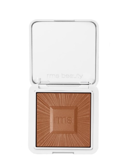 Ein Make-up-Kompakt mit Bronzer in einem weißen Gehäuse mit Spiegel.