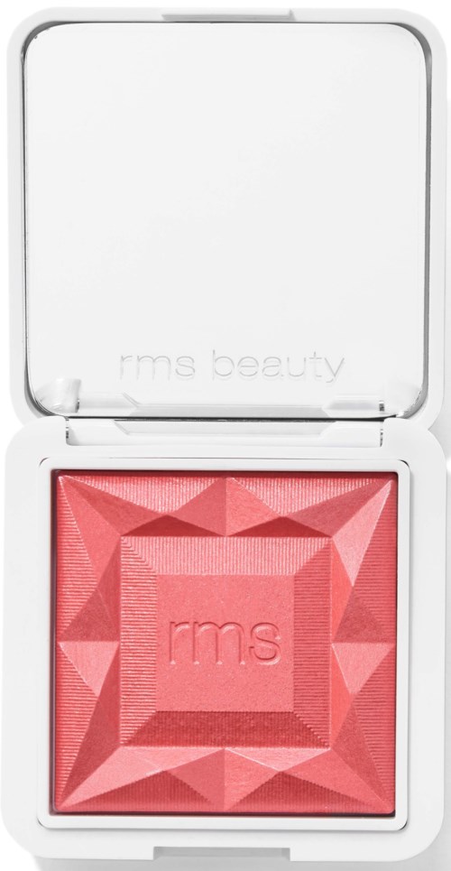 Ein rosa Blush in einer weißen Dose mit geometrischem Muster und einem Spiegel im Deckel.