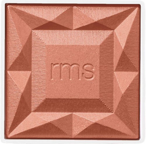 Ein quadratischer bronzefarbener Kompakt mit geometrischen Mustern und den Buchstaben 'rms' in der Mitte.