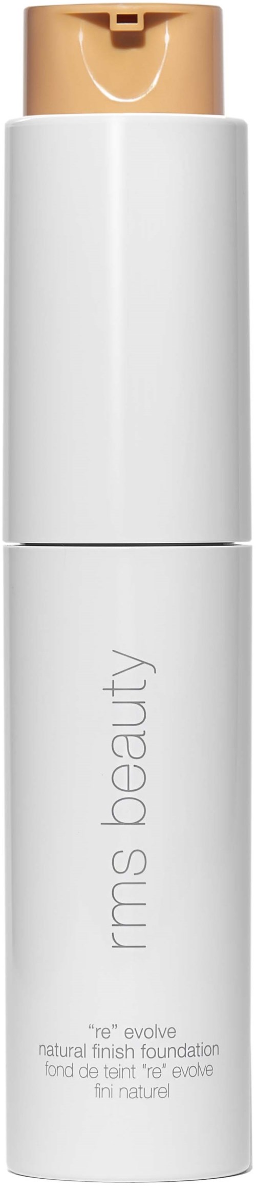 En vit flaska med beige lock, märkt 'rms beauty' och 'natural finish foundation' för ansiktsmakeup.