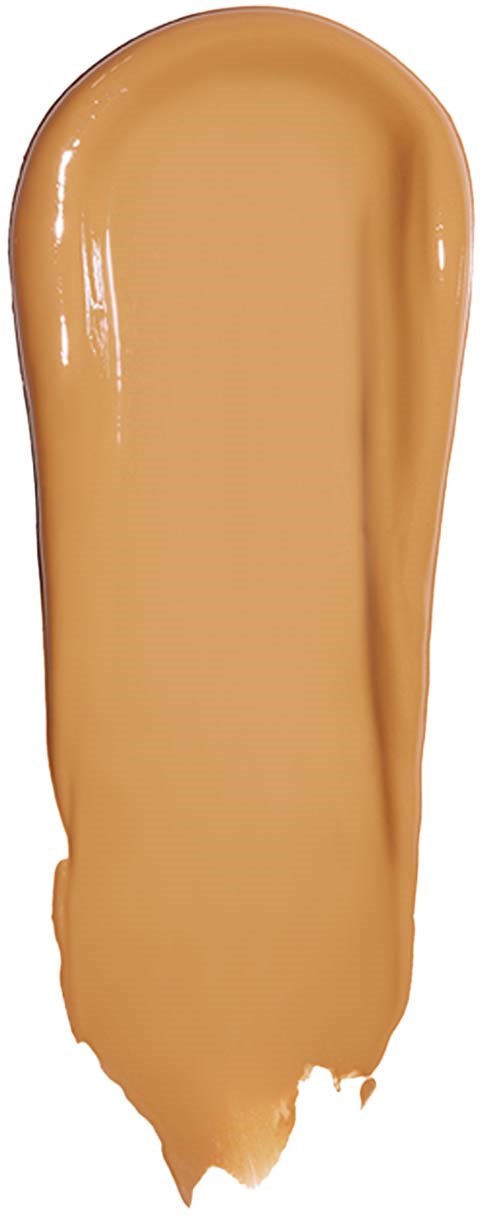 Lång, böjd linje av beige flytande makeup eller foundation med glänsande, slät yta.