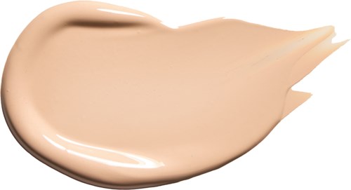 Eine beige flüssige Substanz mit glatter, cremiger Textur auf weißem Hintergrund.