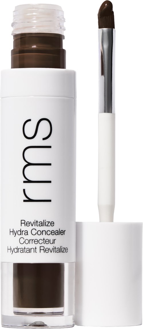 Ein weißer RMS Revitalize Hydra Concealer mit Pinselapplikator, der dunklen Concealer zeigt.