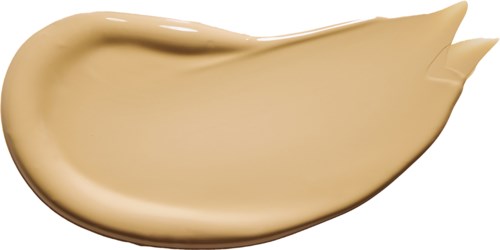Eine beige, cremige Form von Foundation oder Lotion mit leichtem Glanz und gebogener Form.