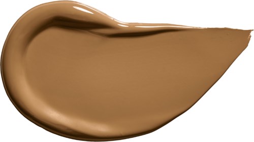 Ein Klecks flüssige Beigefarbe, Creme oder Foundation mit glatter, dicker Textur, geformt wie ein Tropfen.