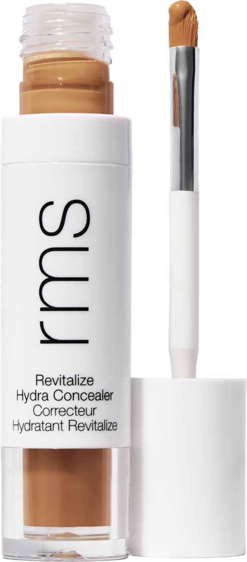 Eine weiße Flasche mit 'rms'-Aufdruck und Applikatorpinsel für Concealer oder Foundation.