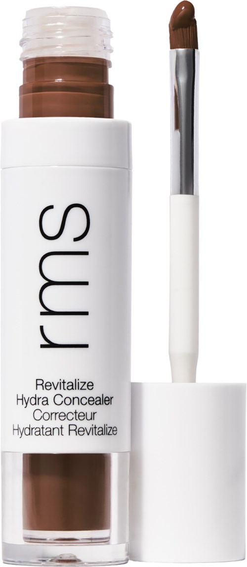 Eine Tube RMS Hydrate Concealer mit Pinselapplikator, weiße und klare Verpackung, schwarzer Text.
