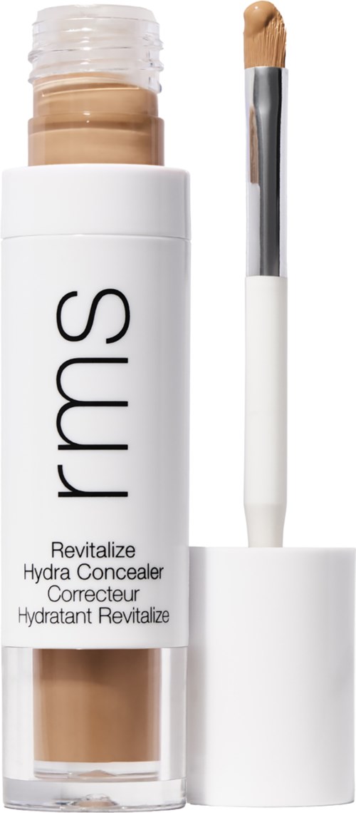 Ein Concealer-Stift mit 'rms' Marke, weißer Kappe, teilweise offen, zeigt beige Produkt und kleinen Applikator.