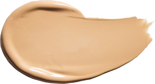 Eine beige Creme mit glatter Textur in Tropfenform aufgetragen.