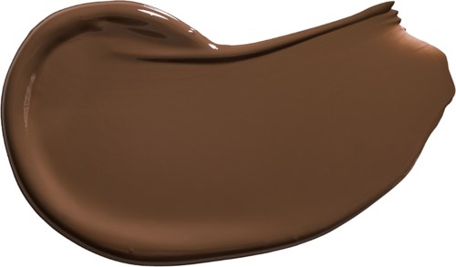 Eine glatte, geschwungene Schokoladenmasse mit glänzender Oberfläche.
