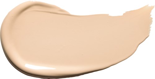 Eine beige Flüssigkeit in Bogenform auf weißem Hintergrund.