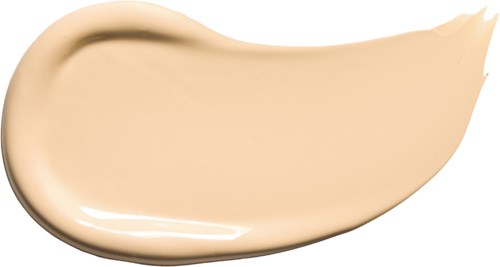 Creme oder Foundation-Probe auf schwarzem Hintergrund, cremige Textur, hellbeige Farbe, runde Kante, glänzende Oberfläche.