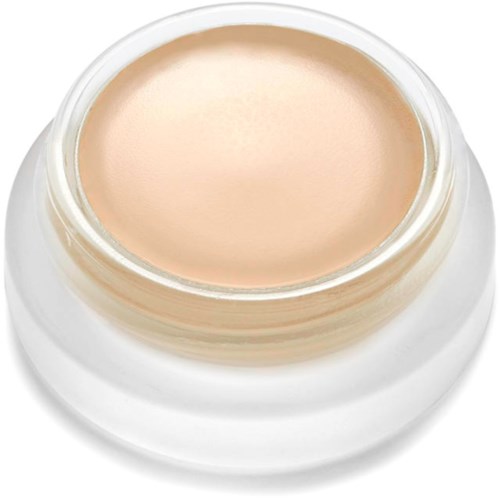 Kleiner Cremetiegel mit beiger Creme, vermutlich Hautpflege- oder Make-up-Produkt, ohne Deckel, glatte Oberfläche.