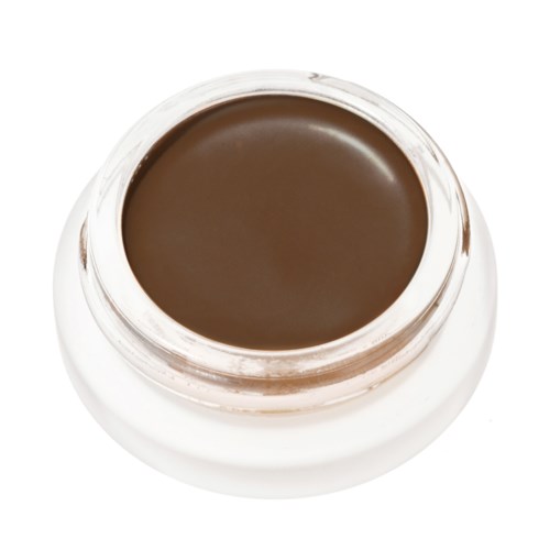 Ein kleiner runder Behälter mit brauner Creme darin, wahrscheinlich ein Kosmetik- oder Hautpflegeprodukt.