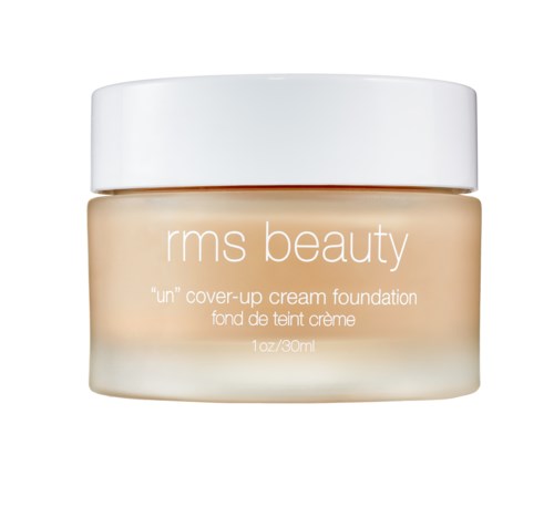A jar of RMS Beauty foundation with a white lid and beige-colored cream inside.