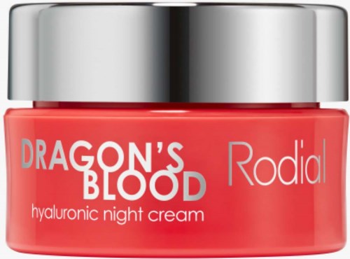 En liten krukke med rosa nattkrem med sølvkork, merket "Dragon's Blood" og "Rodia," for hudpleie.
