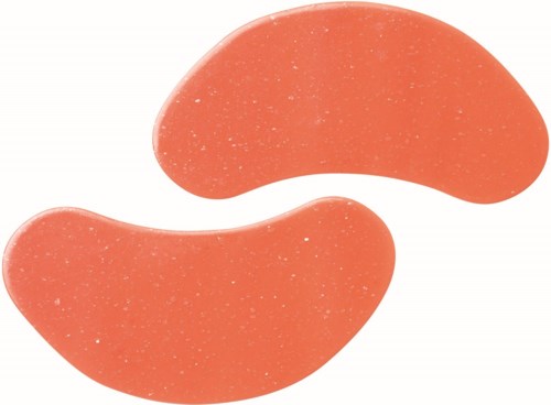 Two orange, kidney-shaped gummy candies on a white background.