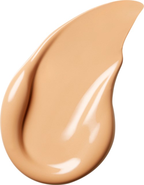 En dråpeformet sminke med glansfull, jevn tekstur og beige farge.