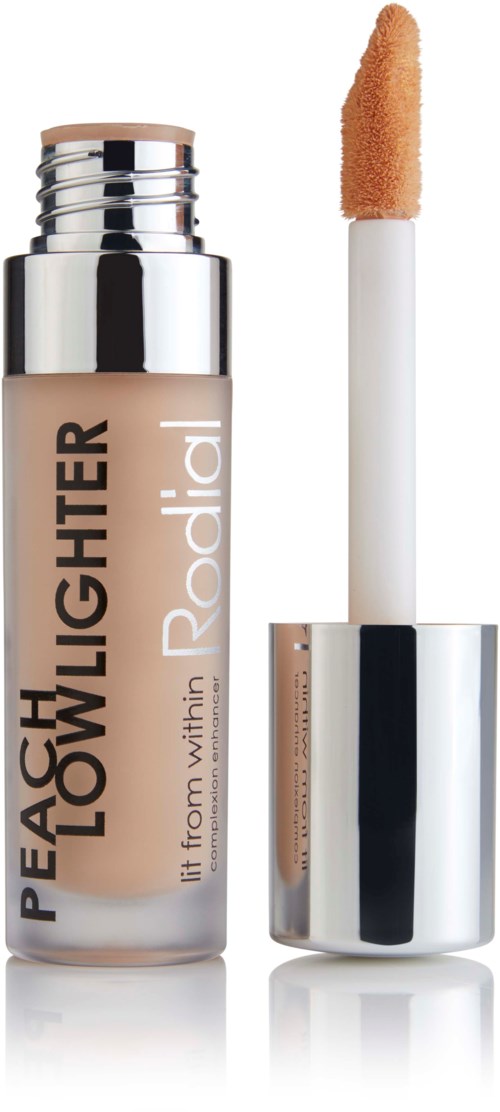 A beige liquid concealer bottle labeled 'PEACE, LOVE, LIGHTER, it from within, Radiant' with a doe-foot applicator.