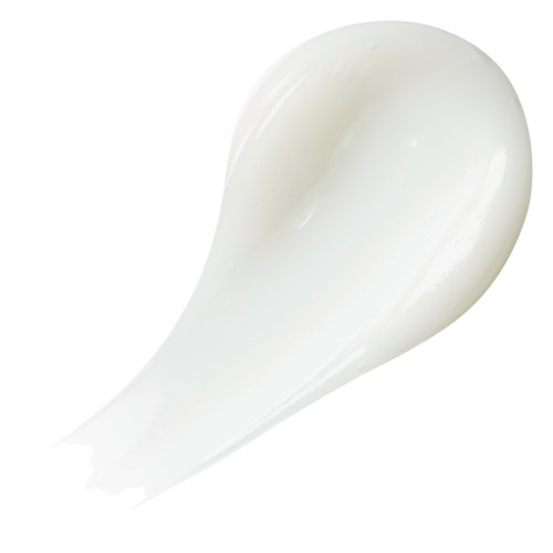 A white, curved substance with a glossy surface, looks like a dollop of cream or lotion.