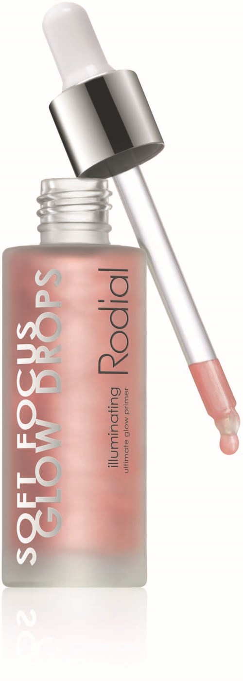 A small bottle with a dropper, labeled 'SOFT GLOW FOCUS BROWS Illuminating Radial,' likely a skincare or eyebrow product.