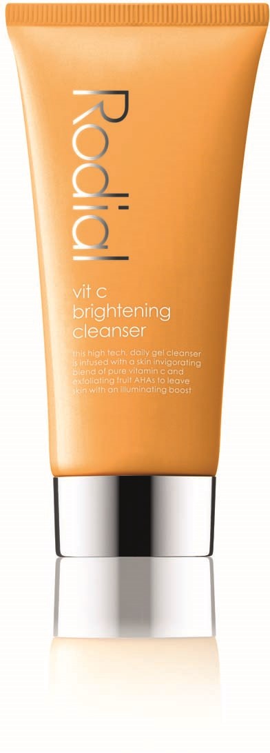A tube of Roidal vitamin C brightening cleanser with a silver cap, orange body, and black text.