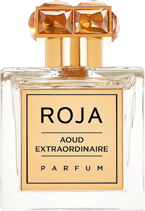 Hajuvesipullo, jossa on merkintä 'ROJA Aoud Extraordinaire' ja koristeellinen korkki ja kirkas lasiteline.