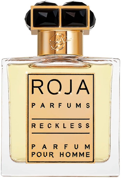 A perfume bottle with a gold cap and a rectangular label that says 'RECKLESS PARFUM POUR HOMME'.