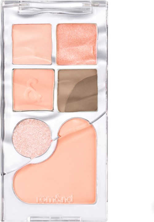 A small makeup palette with various shades of blush and a heart-shaped sponge.