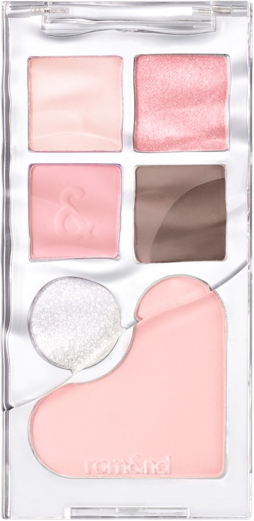 En makeup-palett med rosa och bruna nyanser, en svamp och en rosa applicator. Paletten är i ett tydligt skal.
