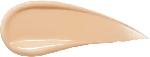 En beigefärgad vätska i form av en tårdroppe, sannolikt foundation eller lotion.