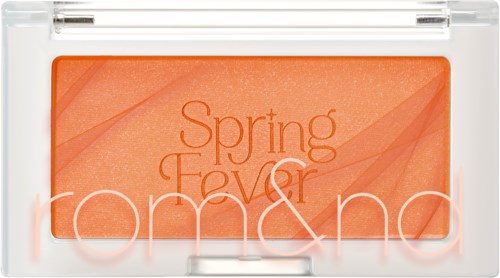 A bright orange blush compact with the words "Spring Fever" and a clear lid.