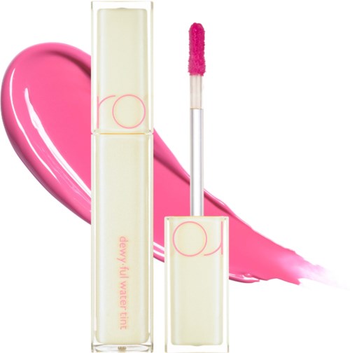 Lipgloss tube met roze gloss en een hartvormige roze vlek erachter.