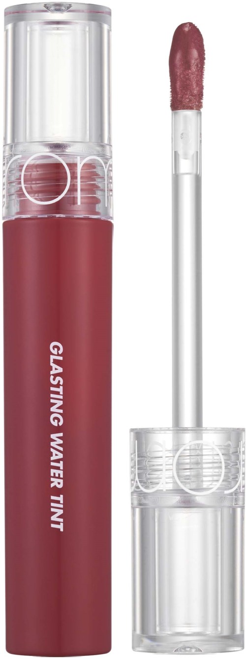 Een lipglossflesje met de tekst "Glisting Water Tint" en een applicatorspons ernaast.