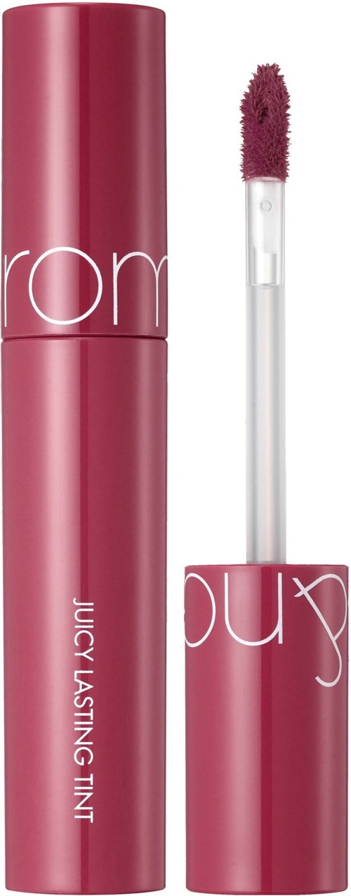 Lippenbalsem tube met applicator, roze kleur, gemarkeerd Juicy Lasting Tint, rechtopstaand.