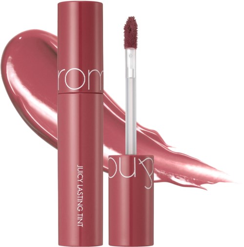 Een roze lipglosshuls met de woorden 'Juicy Lasting Tint' en eenvage roze lipstickvlek.