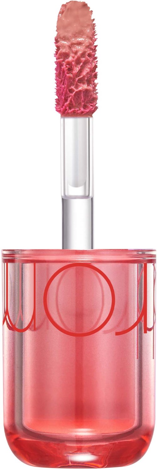 Pink lip gloss with a fluffy applicator stick in a pink-tinted bottle.