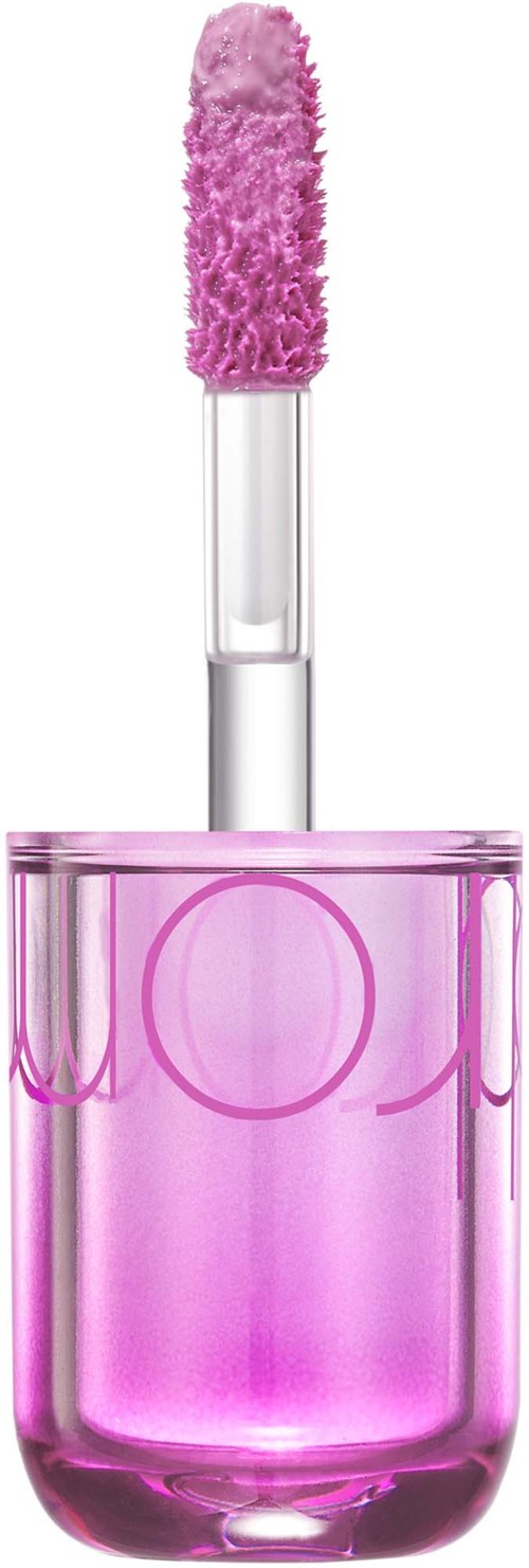 A pink lip gloss with fluffy applicator and clear bottle showing it is almost full.