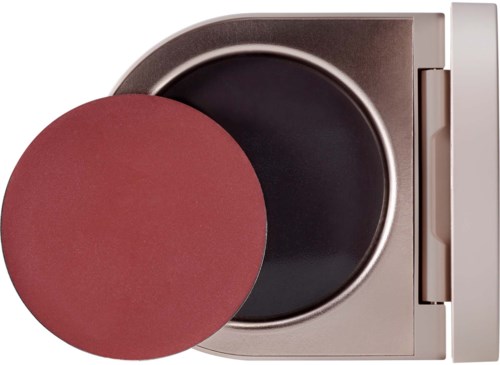 A washing machine door with a red cloth or sponge near it, possibly for cleaning.