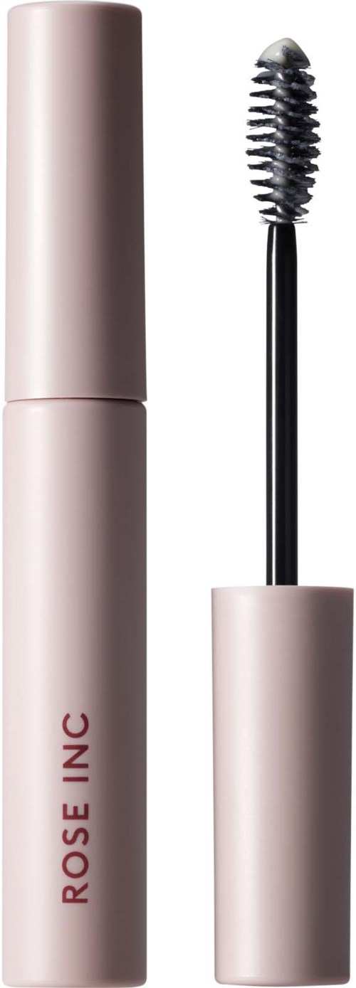 Een roze mascara-huls met de wimpers borstel eruit, gemerkt 'ROSE INC.' aan de zijkant.