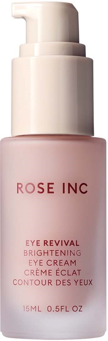 Kleine, lichtroze fles met witte pomp gemarkeerd 'Rose Inc' voor oogverhelderende crème.