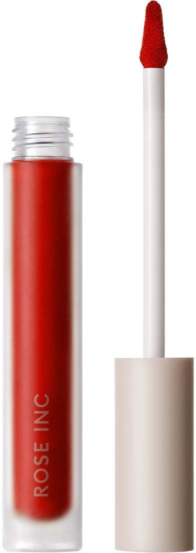 A red lip gloss with a white applicator wand and cap, labeled "ROSE INC" on the tube.