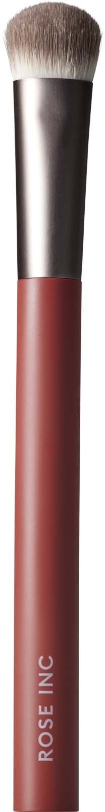 Ein Make-up-Pinsel mit silberner Zwinge und pinkem Griff, beschriftet "ROSE INC.".