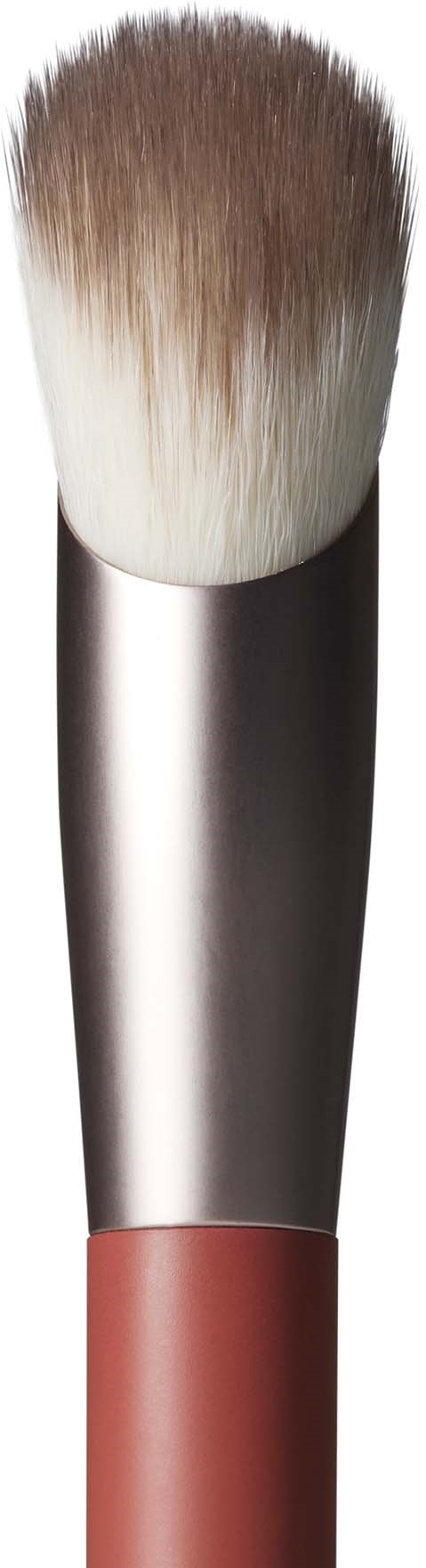 A makeup brush with a black handle, metal middle, and soft bristles, mostly white with brown tips.